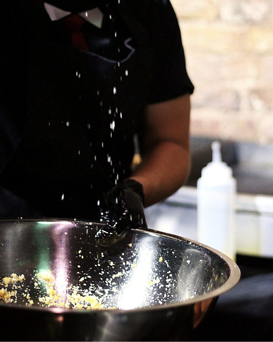 Crew member in the tux tee seasoning chips